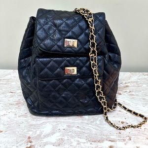 Black quilted backpack with chain-strap